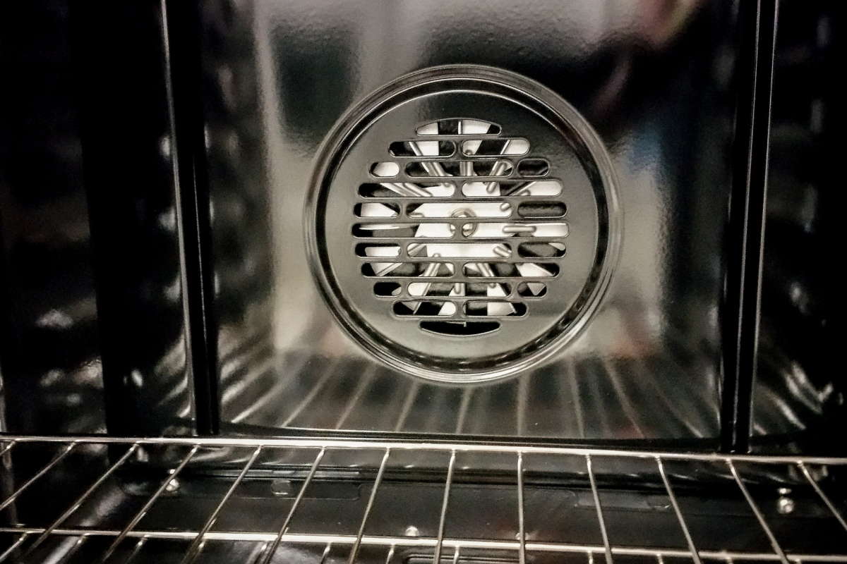 Close-up of a Thermador oven cooling fan grille inside the oven cavity
