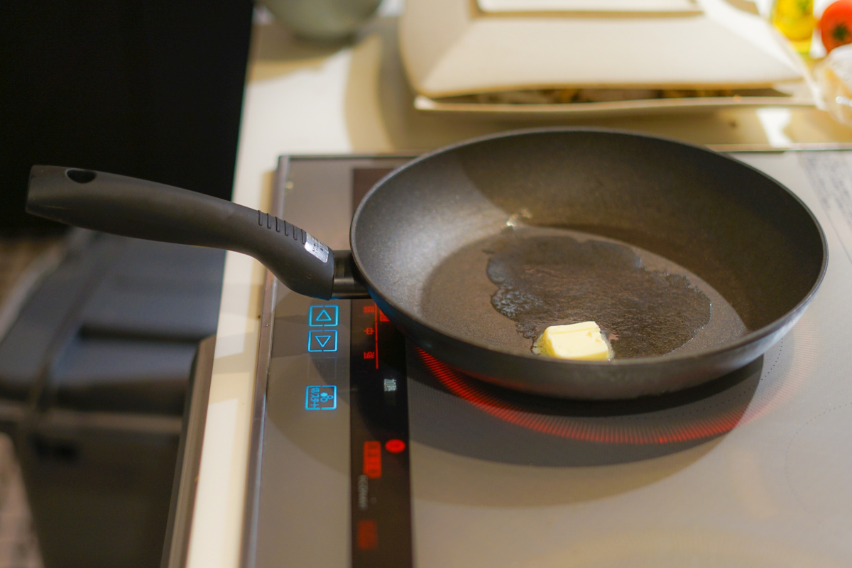 Pan of butter sitting on an induction stove not working with the burner active